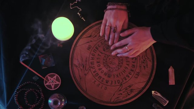 Medium shot of WitchCraft Ouija Board Spirit Game
