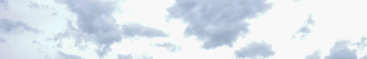 Blurry fluffy clouds floating in the sky