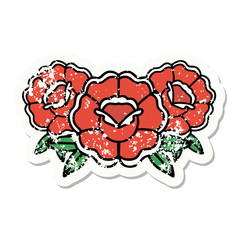traditional distressed sticker tattoo of a bouquet of flowers
