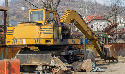 Used excavator out of use. Old equipment