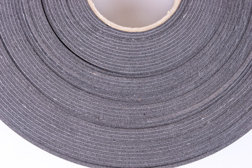Gray roll of adhesive tape to seal