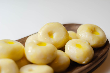 Traditional Silesian dumplings with a hole,  homemade noodles served with butter