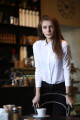 The girl in the cafe breakfast