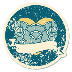 distressed sticker tattoo style icon of a heart and banner with flowers