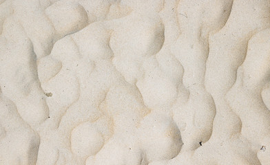 Sand pattern of a beach in the summer. Real photo Thailand.