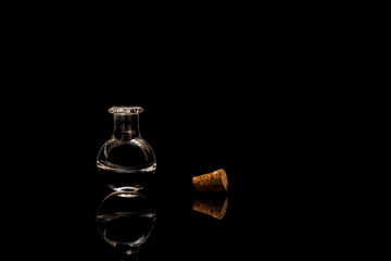 Obraz na płótnie Canvas Glass test tubes with liquid isolated on a black background.