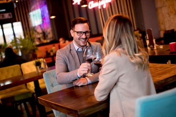 Young couple enjoying lunch in the restaurant