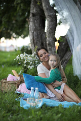 mother with daughter at a picnic