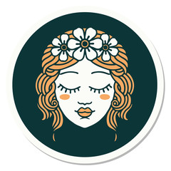 tattoo style sticker of female face with eyes closed