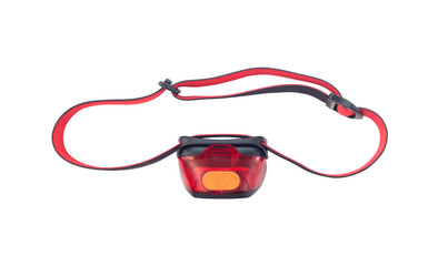 Red headlamp with strap isolated on white background © lilkin