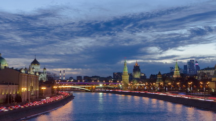 Obraz premium Ensemble of Moscow Kremlin and Moskva-City business center view across Moskva river at a winter day to night timelapse