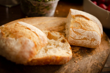 pieces of ciabatta on a wooden board