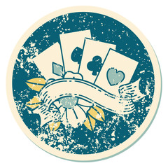 distressed sticker tattoo style icon of cards and banner