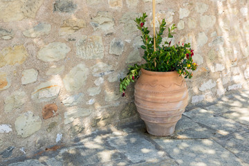 Old brown amphora in mediterranean style. Greece.