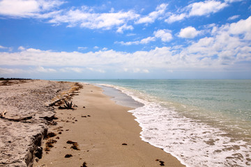 Coast of Sanibel Island with blue sky and clouds