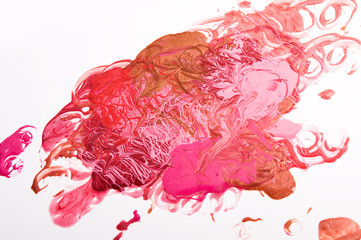 The colors of nail polish. Beauty texture, pattern and background. Colorful red and pink cosmetics.