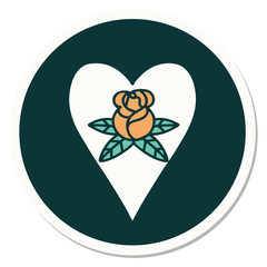 tattoo style sticker of a heart and flowers