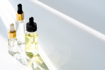 Anti aging serum with collagen and peptides in glass bottles with dropper 