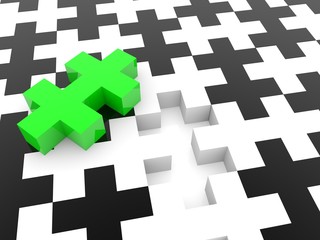 A green puzzle piece over a black and white puzzle