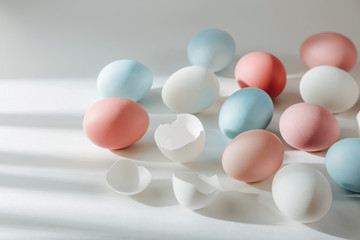 Natural Colored Eggs with sunlights. Compositions in pastel colors. Easter consept.  Flat lay, top view