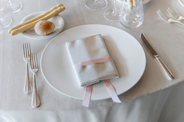 Detail of a table set for a banquet