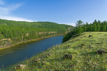 Fototapeta na wymiar High steep rocky riverbank. Siberia.