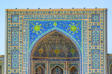 Parade portal of Tilya-Kori Madrasah, a part of Registan medieval architectural ensemble, Samarkand, Uzbekistan