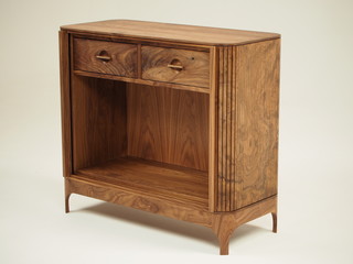 Original designer chest of drawers made of natural wood in its entirety, as well as its details on a white background, from different angles.