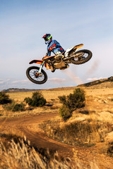 Naklejka premium motocross sand dirty sun down