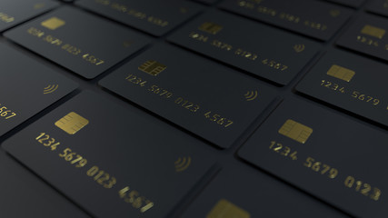 3d render of the black credit cards with grid structure isolated on a black background with gold detail embossing and depth of field.