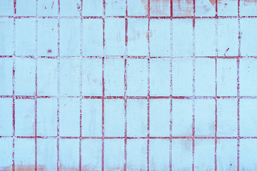 Texture of a wall covered with tiles, stock photo.
