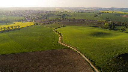 Beautiful aerial landscape in Moravia, Czech Republic. Sunrise over rolling hills in Moravia, aerial drone view.