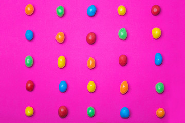 colored sweets lie in rows