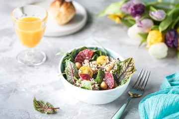 healthy salad with quinoa, vegetables and grapefruit. Horizontal