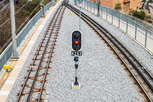 Railway signal between parallel train tracks at Montserrat mountain railway in Spain