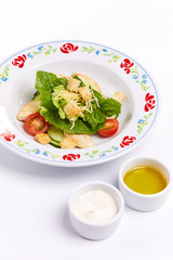 caesar salad with dressing, top view
