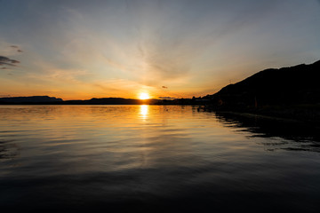 Fototapeta na wymiar Sunset evening landscape, Rosendal, Norway. Norwegian fjords sea mountain view.