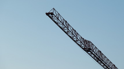crane on background of blue sky