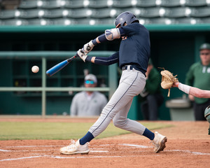 Young Baseball Player competing in a baseball game