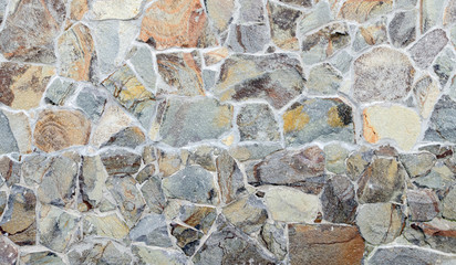 Textured masonry fence