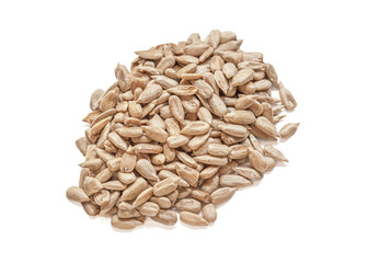 peeled sunflower seeds isolated on white