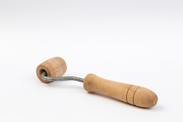 wooden roller on white background