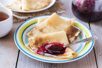 Pancakes with black currant jam