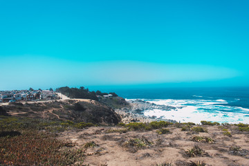 Fototapeta na wymiar wave breaker viewpoint in punta de tralca beach