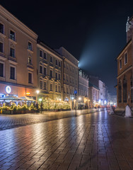 Krakow, Poland, Mikolajska street and old houses illuminated in the night