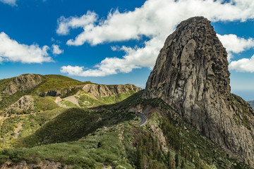 Agando rock in La Gomera island. A volcanic plug, also called a volcanic neck or lava neck, is a volcanic object created when magma hardens within a vent on an active volcano