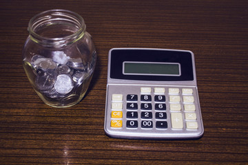 piggy bank and calculator.