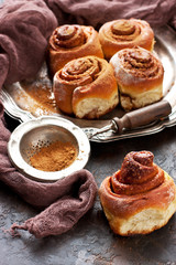 Baked sweet buns with cinnamon