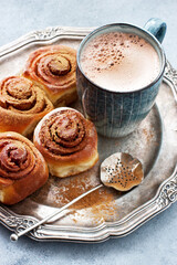 Hot cocoa drink with  homemade  cinnamon buns