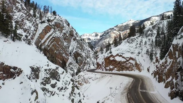 San Juan Mountain Range view from the air and the Highway 550 in Ouray, Colorado
